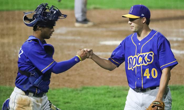 Wilmington catcher MJ Melendez (left) and catcher Collin Snider come off the field after retiring the side in the eighth inning of the Blue Rocks' 3-1 loss in the opening game of the Mills Cup Championship Series Tuesday at Frawley Stadium. Fayetteville 3 Rocks 1